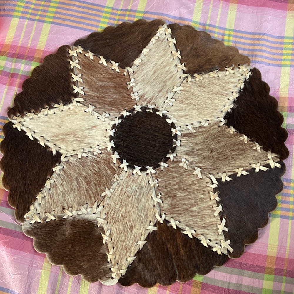 Vintage cowhide handlaced round placemat